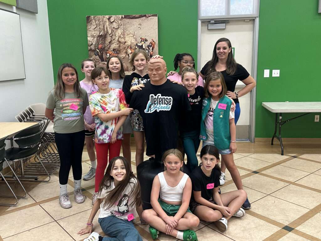 Girl Scout Classes Defense in Heels